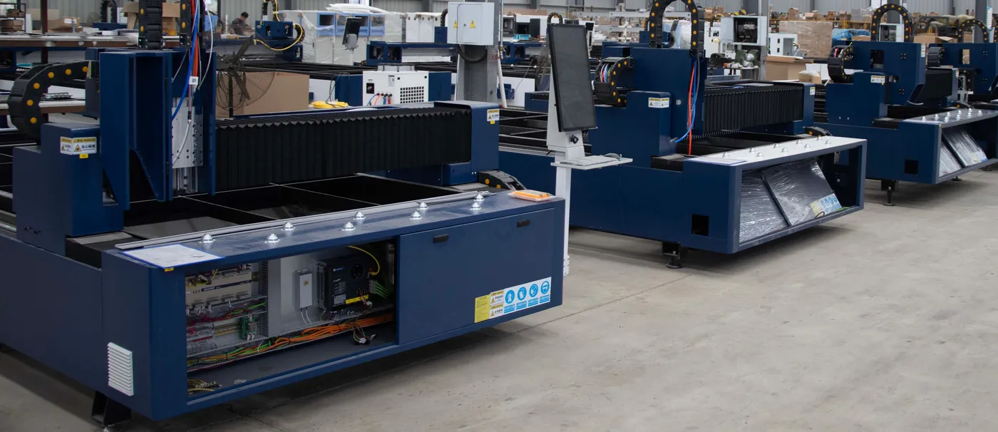 Rows of CNC machines on a factory floor