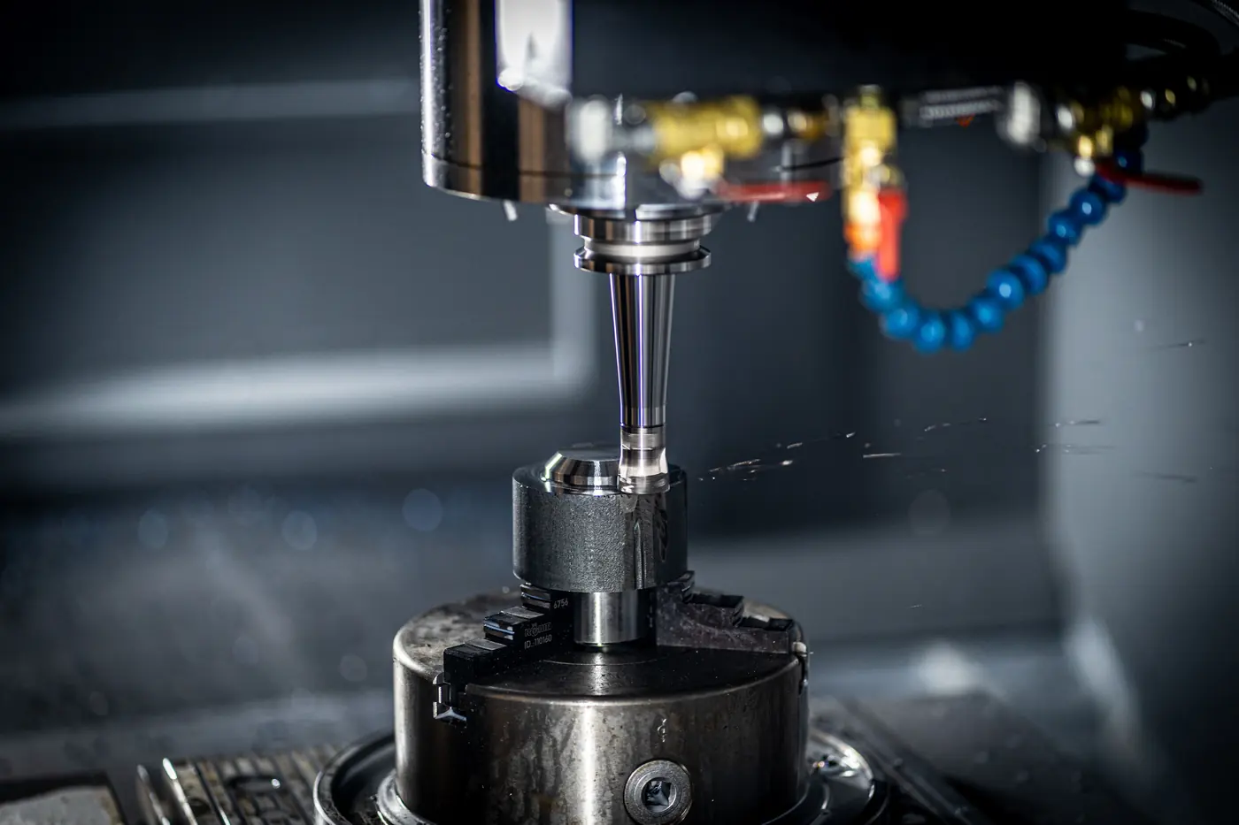 A CNC milling machine cutting metal